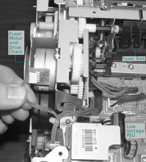 Fuser motor plug removal